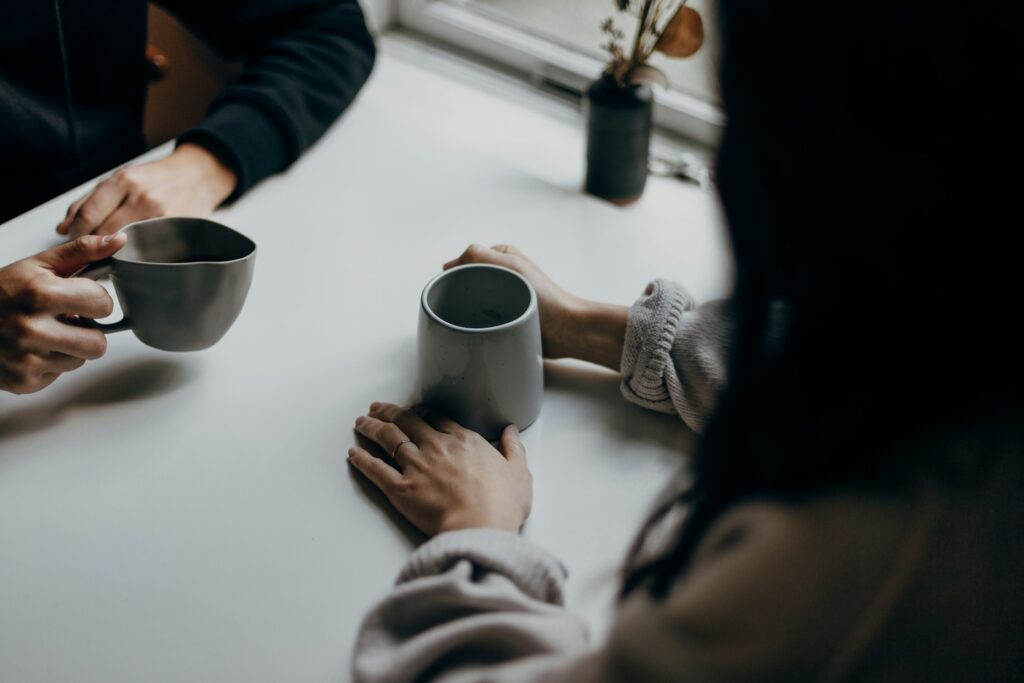 Vermont business owners chatting over coffee