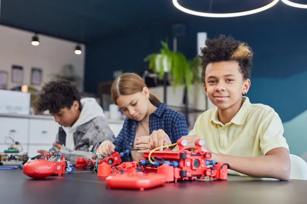 Students doing a robotics project at an after school program.